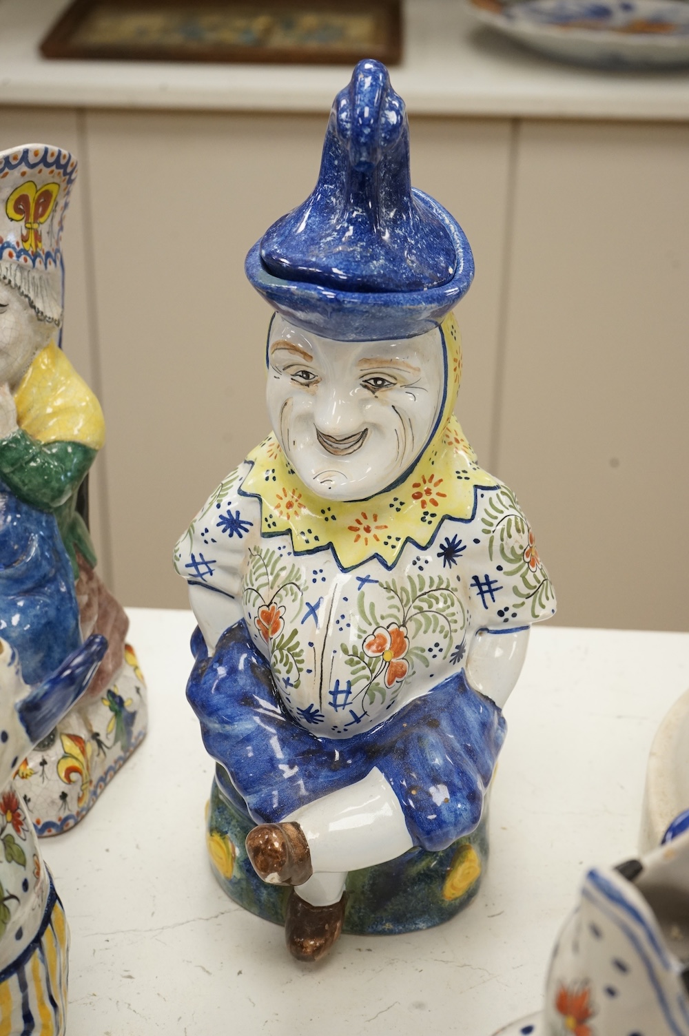 A group of five pieces of French tin glazed pottery, tallest 32cm